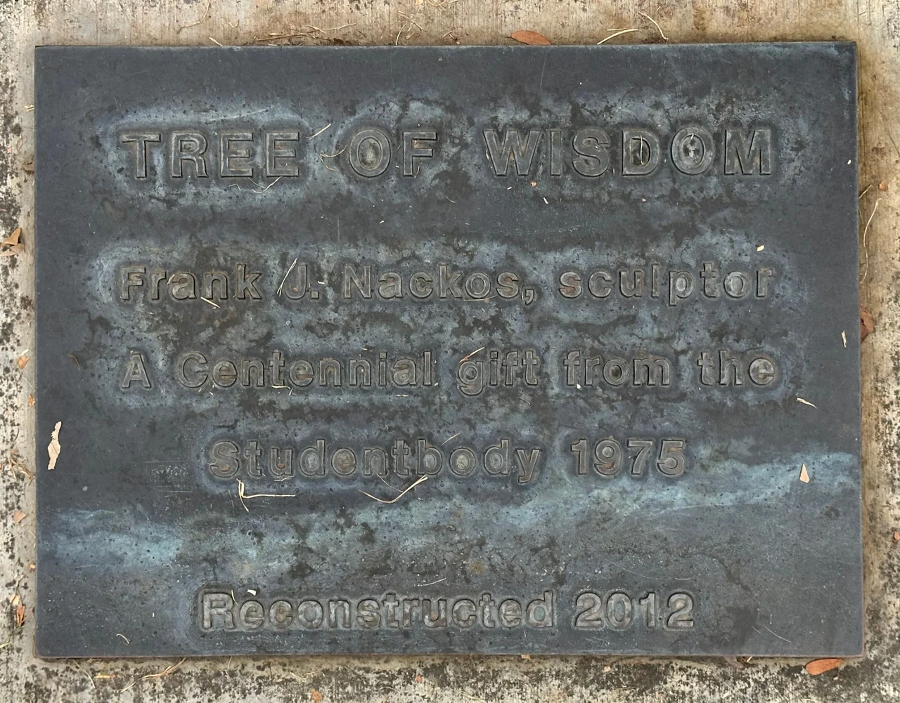 Upright Tree of Wisdom plaque crediting Frank J. Nackos and the centennial gift